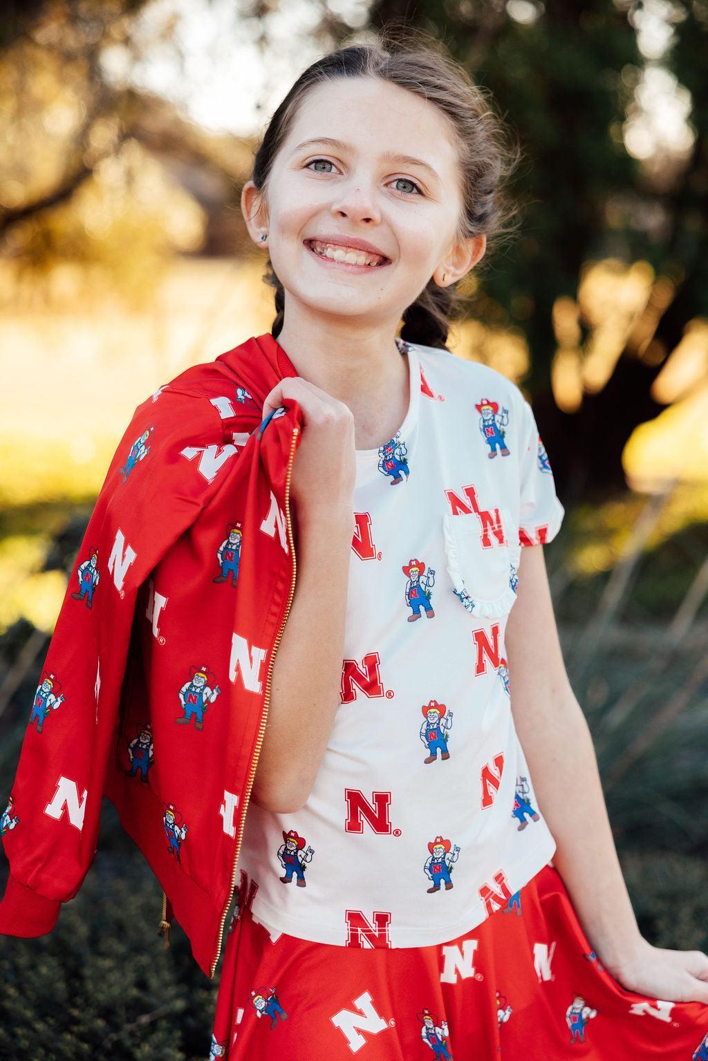 Nebraska White Herbie Husker Ruffle Pocket Tee